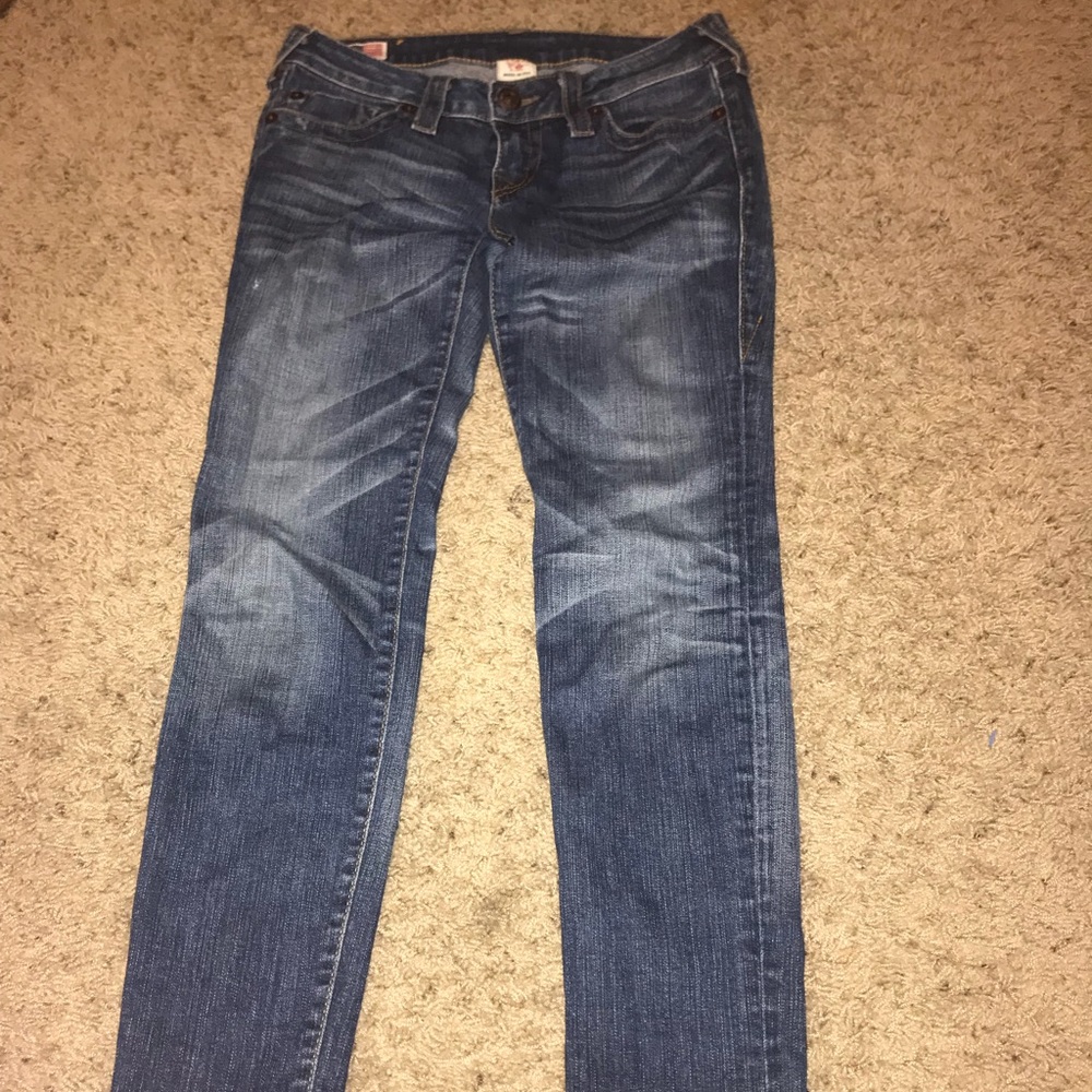 medium wash low rise jeans true religion